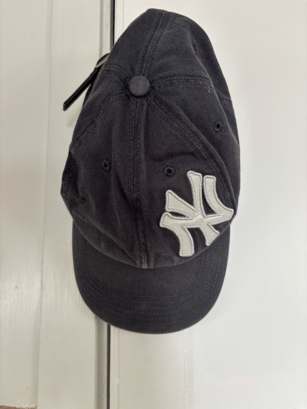 Weathered navy blue Baseball Cap with White Embroidered Logo